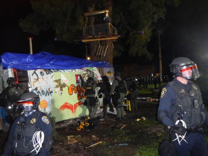Police surround the kitchen.